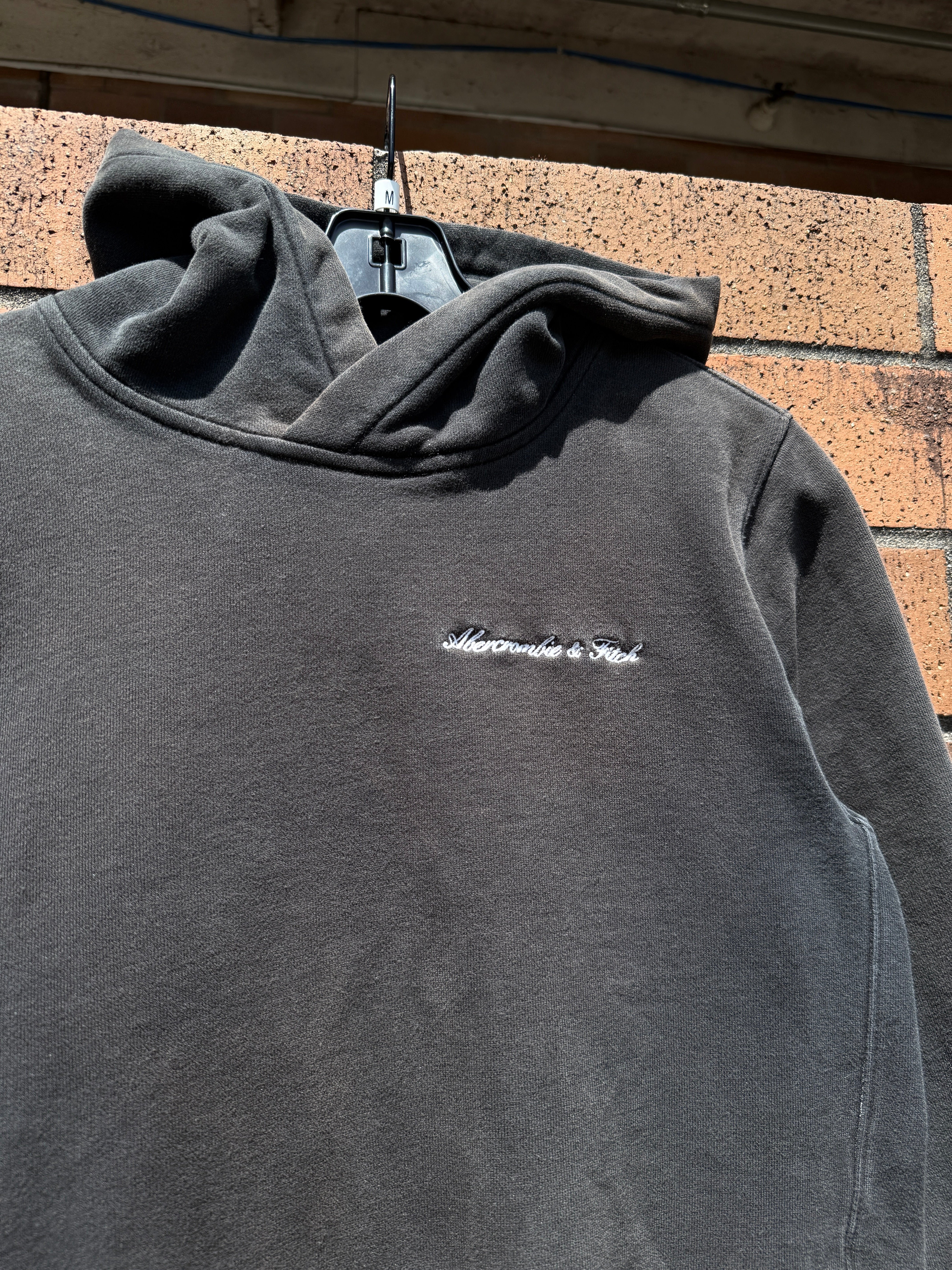 2010s Abercrombie & Fitch Faded Black Script Hoodie Size M